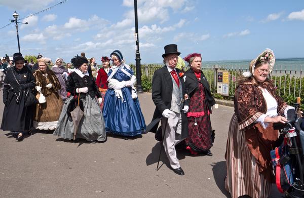 People in Victorian Clothes as part of annual Dickens Festival Parade