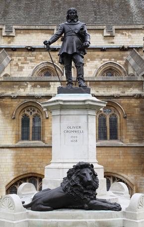 Statue of Oliver Cromwel with lion at its base