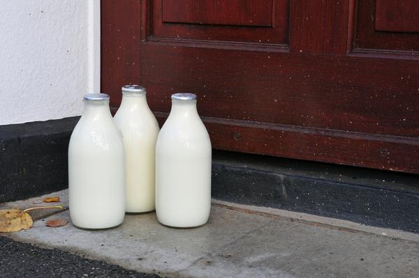 Bottles of Milk on a Doorstep