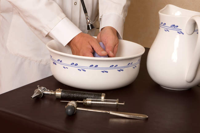 Doctor washing hands