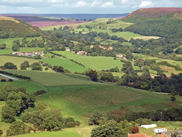 Road to Hawnby with the North Yorkshire Moors in the background