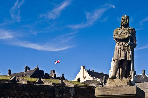 King Robert The Bruce statue under a cloudy sky, in the castle of Stirling, Scotland