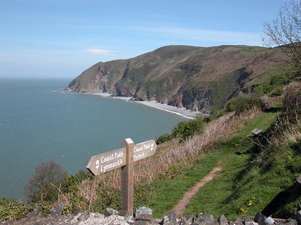 View of Foreland Point with signpost, North Devon