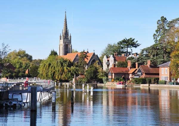 The River Thames at Marlow in England with Weir and Church in the background