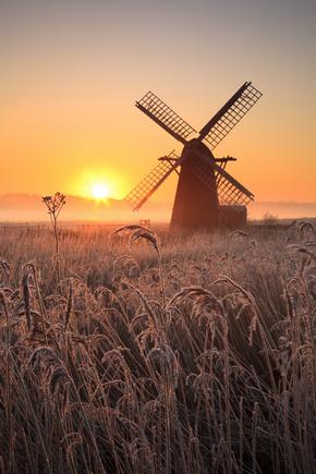 Herringfleet smock mill in the mist on a winter morning.