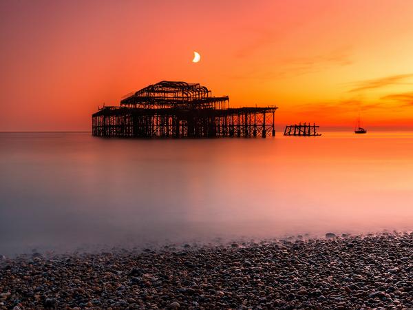 West Pier Remains © Shutterstock / piotreknik The remains of the West Pier in Brighton at twilight