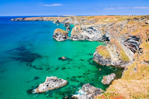 Carnewas Cliffs with Bedruthan Steps in the background.
