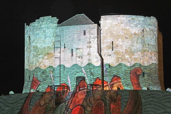 Cliffords Tower at night illuminated with patterned lights