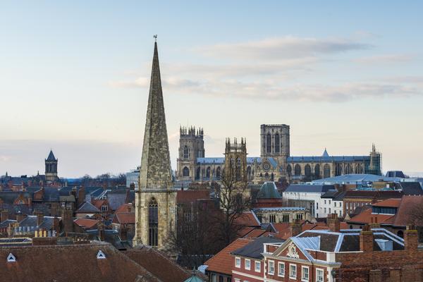 View of North of York as seen from Clifford's Tower, with York Minster in the distance.
