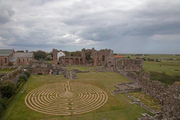 Lindisfarne Priory with maze in foreground