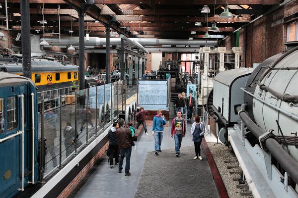 Visitors in the large engine hall at the Museum of Science and Industry in Manchester