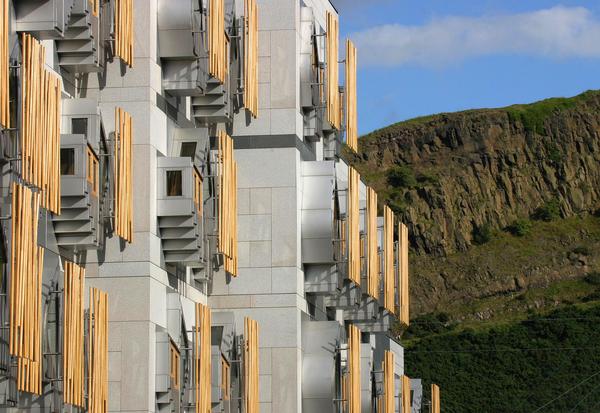 Side view of building with Salisbury Crags in background