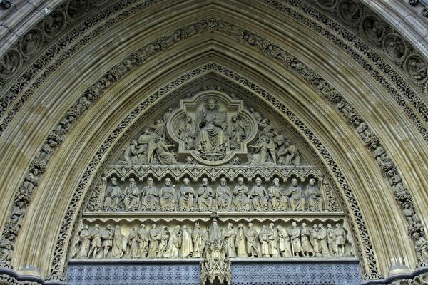 Closeup of carvings above door in Westminster Abbey