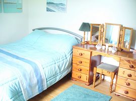 One of the bright bedrooms