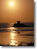 Sunset over Le Rocco Tower, St. Ouen - Picture courtesy of www.britainonview.com