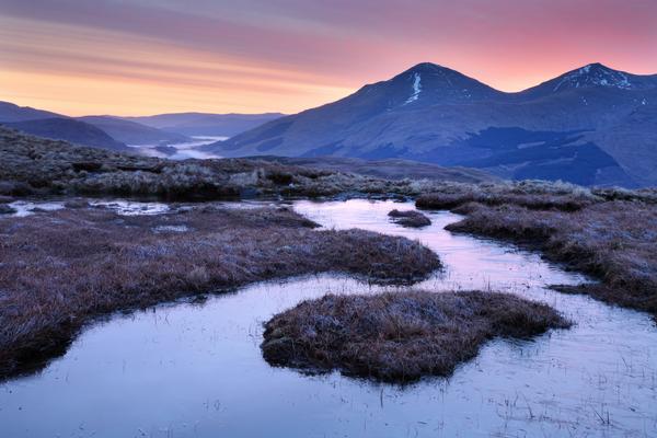 Mountains on a winters dawn in the north of Loch Lomond and the Trossachs National park