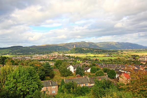 Rooftop view of Stirling, with the Wallace Monument in the distance