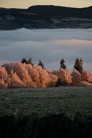 Bunkhouse view; Cotton clouds in valley.