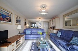 Spacious lounge with sea views