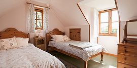 The 2nd bedroom with 2 single beds