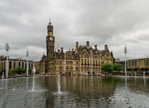 Bradford Town Hall, a wonderful gothic building, behind the City Park fountains and water feature