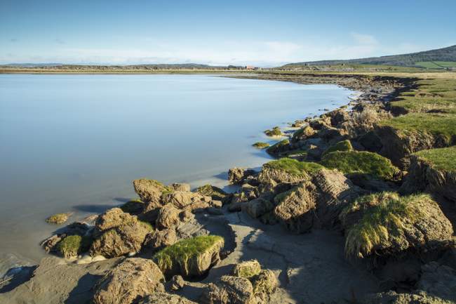 Morecambe Bay - long exposure showing coastal erosion.