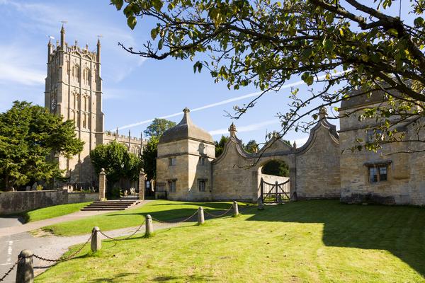 St James Church with ornate stonework for gateway to Campden house in the foreground