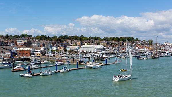 Boats in Cowes Harbour, Isle of Wight on a summer