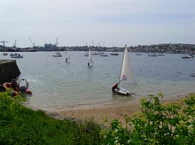 Glimpse of Kiln Quay Beach, Flushing towards Falmouth Docks &copy; Karen Gibson