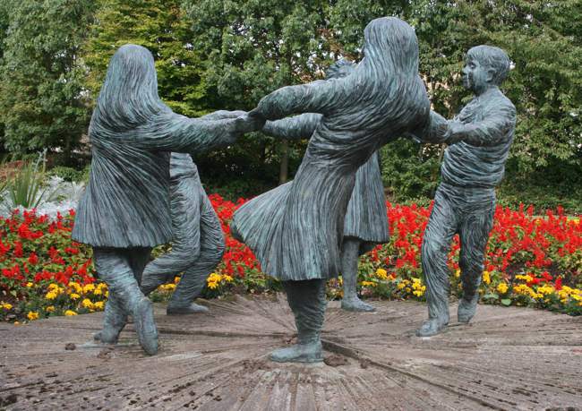 The Dream by Malcolm Robertson symbolises the friendship of young people regardless of race or background. It is situated near Church Street, opposite Glenrothes Town Centre. &copy; Ian Sloan Photography