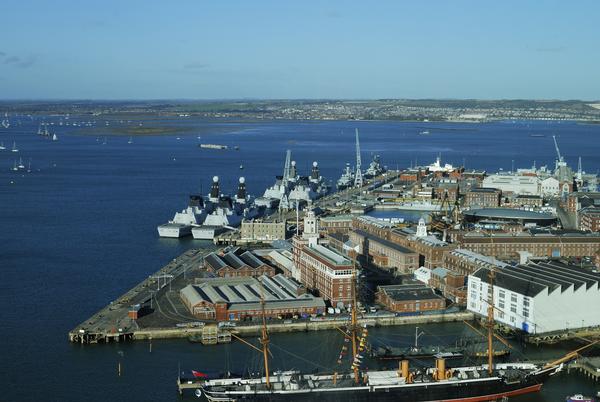 Portsmouth Harbour And Navy Dockyard From The Spinnaker Tower ©Shutterstock /Nick Hawkes Aerial view of Portsmouth Harbour and Navy Dockyard from the Spinnaker Tower. Hampshire. England