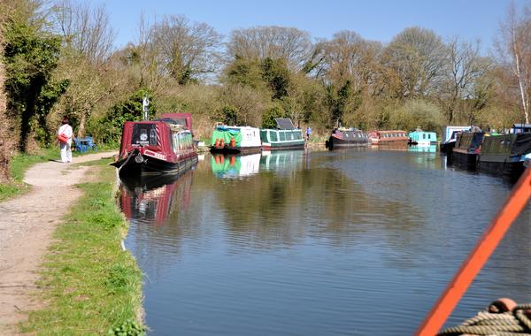 Colourful canal boats on the Grand Union Canal which passes through Hemel Hempstead