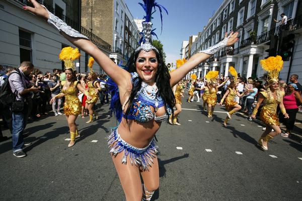 Notting Hill Carnival ©Shutterstock /Bikeworldtravel Performers in the Notting Hill Carnival which takes place every August