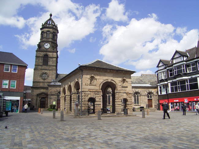 The Buttercross with St Giles Parish Church &copy; Stan Walker