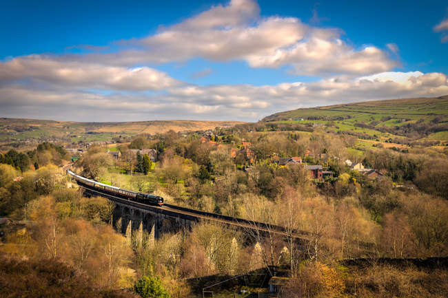 The Britannia 70000 steam train crossing over the Saddleworth Viaduct